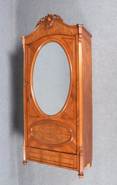 Kleiderschrank, spiegelfurniert, beschn. Bekrönung, 1x Tür mit ovalem Spiegel, 1-schübig