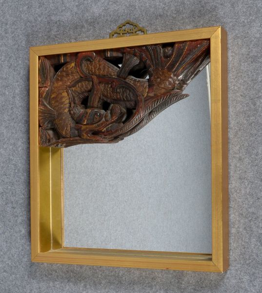 Wandspiegel, Hartholz durchbr. geschnitzt, Ecke mit halbplast. Drachenmotiv