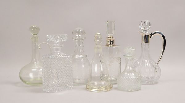 7 Glaskaraffen, versch. Ausführungen/davon 2x mit Silbermontur; Höhe 17 - 28,5 cm