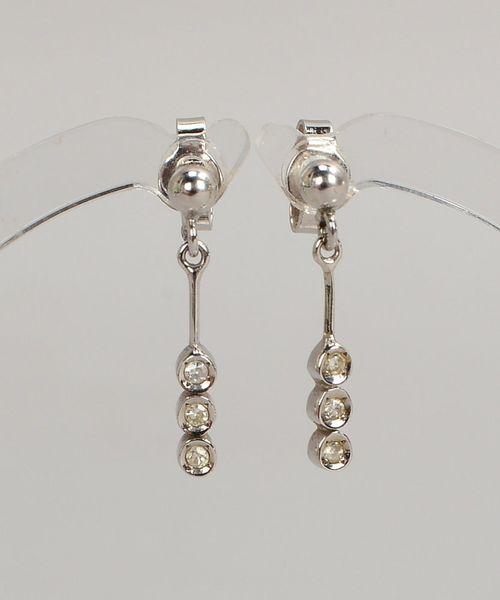 Paar Ohrstecker, 585 WG (gest.), besetzt mit je 3x kl. Diamanten; Länge 1,8 cm, Gew. 1,20 g
