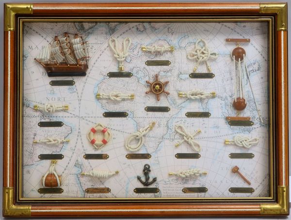 Knotentafel, mit Seekarten-Hintergrund, aufwändig gerahmt; Maße 45 x 60 cm