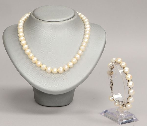Halskette und Armband, mit Perlenbesatz, 925 Silber gef./Silber-Karabinerschl.