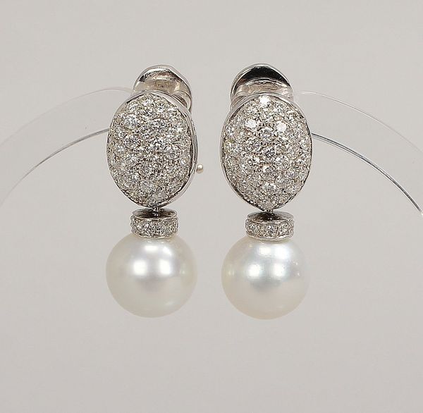 Paar Ohrstecker, 750 WG (gest.), mit Perle und Diam./zus. ca. 1,35 ct; Gew. 9,20 g