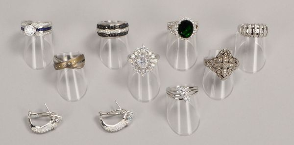 Silberschmuck, 925 Sterlings./div. Besatz: 8x Ringe und Paar Ohrstecker; Gew. 49 g