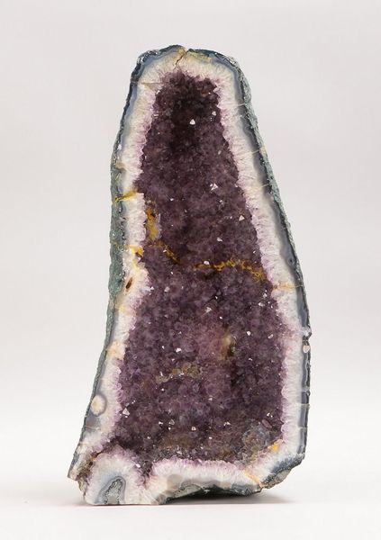 Gr. Amethystdruse (wohl Brasilien), geschnitten, Calcit-Ummantelung; Höhe 49 cm