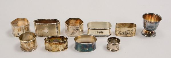 Tafelsilber-Konvolut: 1 Eierbecher, 5x Serviettenringe, Gew. 118 g; anbei 4x vers. Ringe