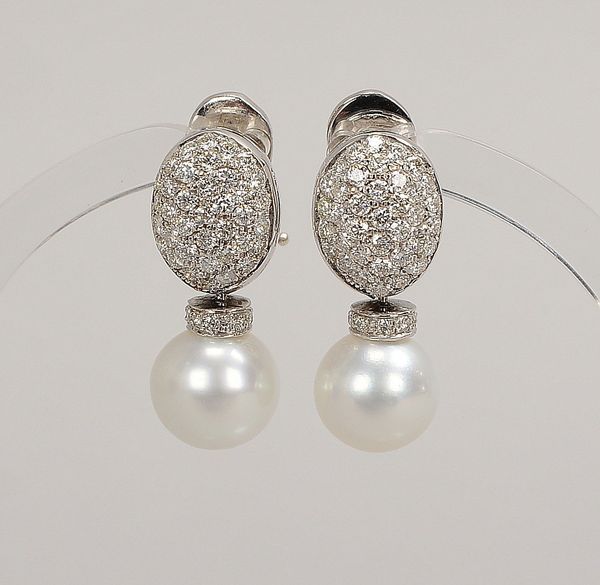 Paar Ohrstecker, 750 WG (gest.), mit Perle und Diam./zus. ca. 1,35 ct; Gew. 9,20 g