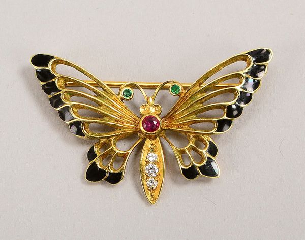 Brosche, 585 GG (gest.), 'Schmetterling', part. emaill., mit kl. Diam., Smaragden und kl. Rubin