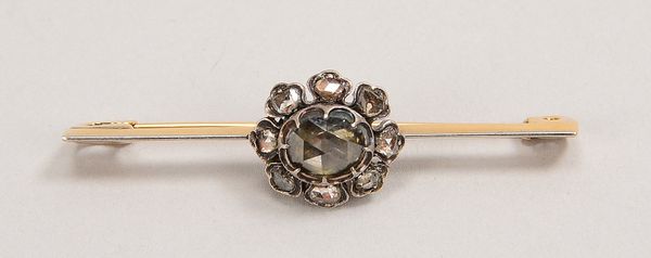Brosche, 585 GG (gepr.) und Silber, mit 9x Diamantrosen; Länge 5 cm, Gew. 5 g