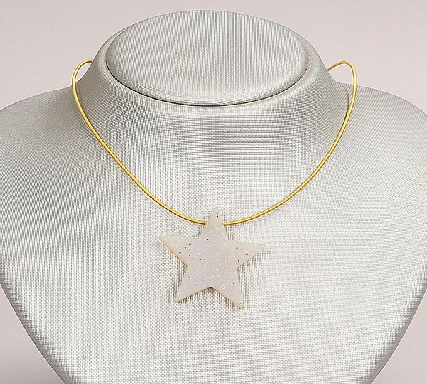 Niessing, Designer-Collier, 750 GG (gest.), Spiral-Halsreif mit figürlichem Anh. 'Stern'