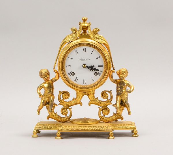 Tischuhr, Hermle 'Collection d'Art', Messing-Uhrw., Geh. Messing/Bronze und Emaille