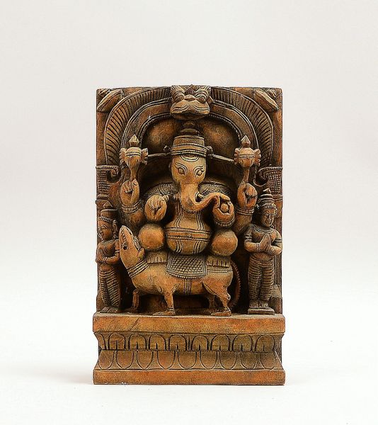 Holzrelief (Indien), Holz geschnitzt, 'Ganesha' - auf Ratte sitzend; Höhe 30,5 cm