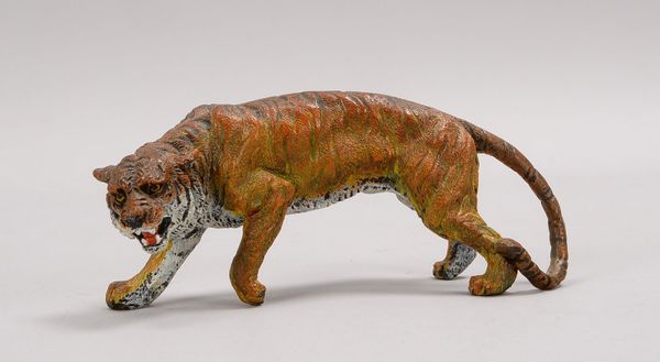 F. Bergmann/Wien, kl. Bronzefigur, 'Schreitender Tiger', polychr., gemarkt; Länge 15 cm