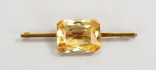 Brosche, 585 GG (gest.), mit Citrin/Maße 16 x 21 mm, im Radiantschliff; Gew. 10,70 g