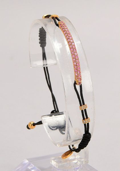Pippo Perez-Armband, 'Strang', 750 RG (gest.), mit vielf. Saphirbes., an Kordelarmb.