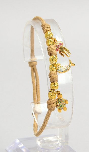 DoDo, 'Prêt-à-Dodo', 3x Charms, 750 WG (gest.), jeweils mit Steinbes., an Kordelarmb.
