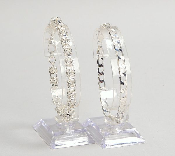 2 Armbänder, 925 Sterlings.: 1x Panzerglieder, 1x 'Königskette'; Gew. 19,60 g