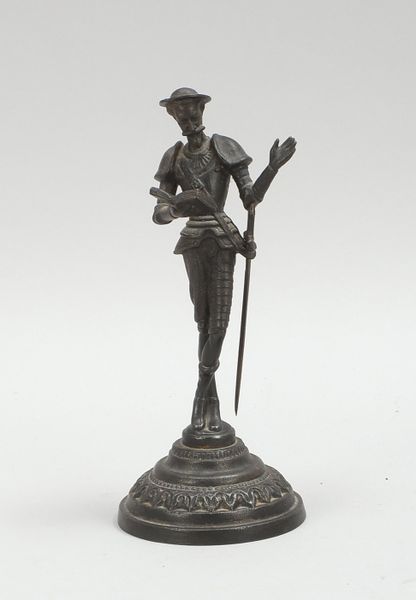 Kleine Eisenskulptur, 'Don Quijote' - mit Schwert und Buch dargestellt, unsigniert; Höhe 20 cm