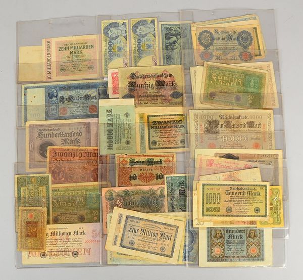 Banknoten: '100', '1.000', '20.000', '1 Mio. Reichsmark'; 1x 'Reichsbahn - 20 Mio.'
