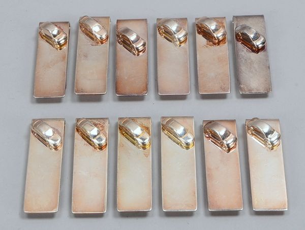Tiffany & Co., 12 Krawattenklammern, 925 Sterlings., mit Applikation; Gewicht 340 g