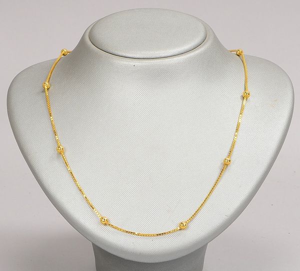 Veneziakette, 750 GG (gest.), mit Goldkugeln besetzt, Federringschließe; Gewicht 14 g