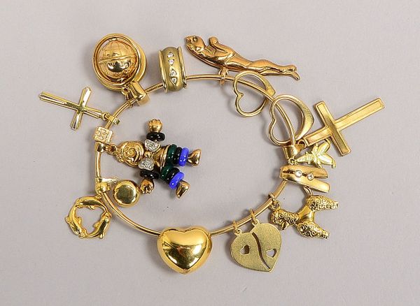 Bettelarmreif, 333 GG (gest.), figürl. Charms/Anh., versch. Goldgehalte, teils Steinbesatz