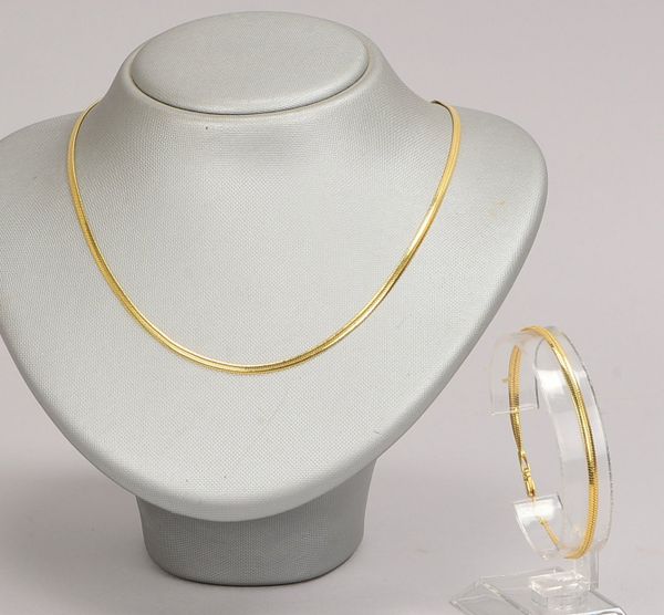 Halskette und Armband, 585 GG (gest.), Fischgräten-Muster, Karabinerschl.; Gewicht 14,90 g