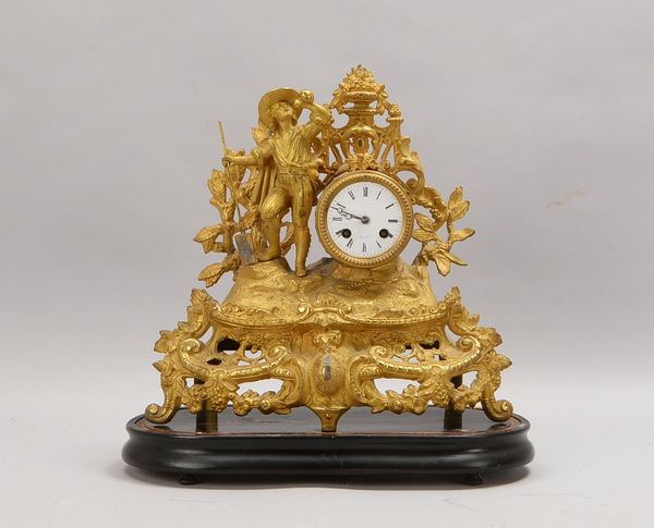 Frz. Kaminuhr, Messingwerk, Schlag auf Glocke, durchbr. Gehäuse, auf Sockel; Höhe 37 cm