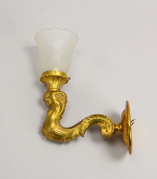 Wandapplikation, 1-flammig, Messingguss, mit figürlicher Applikation im Art déco-Stil ('Meerjungfrau