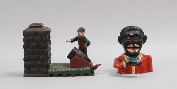 2 figürliche Sammler-Spardosen, Gusseisen, farbig gefasst, mechanische Ausführungen: 1x 'Artillery